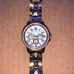 Flashy white and gold watch